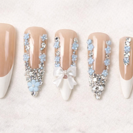 nude & white french with blue floral & rhinestone decor